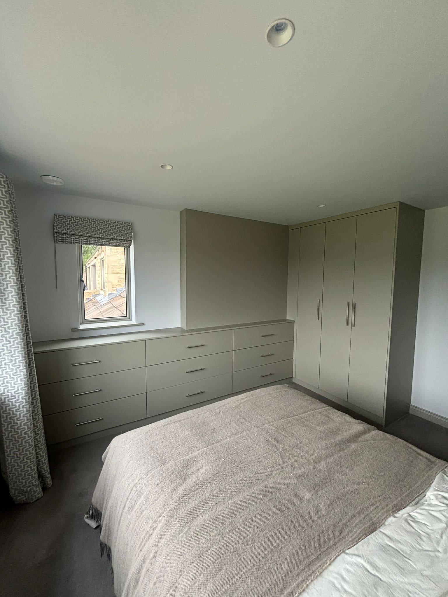 Bespoke bedroom furniture project with wardrobes, custom vanity unit and bedside tables